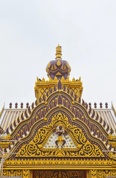 Detail of ornately decorated unconstruction temple roof — Stock Photo, Image