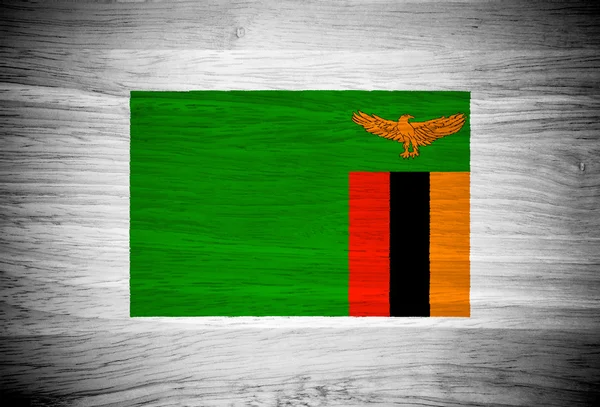 Zambia vlag op houtstructuur — Stockfoto