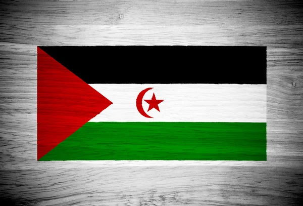 Western Sahara flag on wood texture — Stock Photo, Image