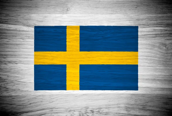 Sverige flagga på trä textur — Stockfoto