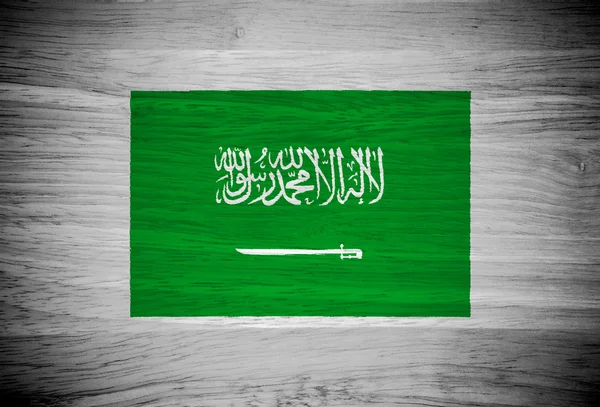 Saudi Arabia flag on wood texture — Stock Photo, Image