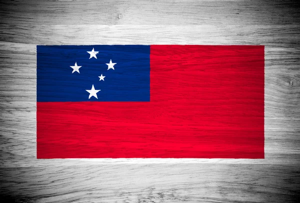 Samoa vlag op hout textuur — Stockfoto