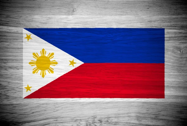Filippinerna flagga på trä textur — Stockfoto