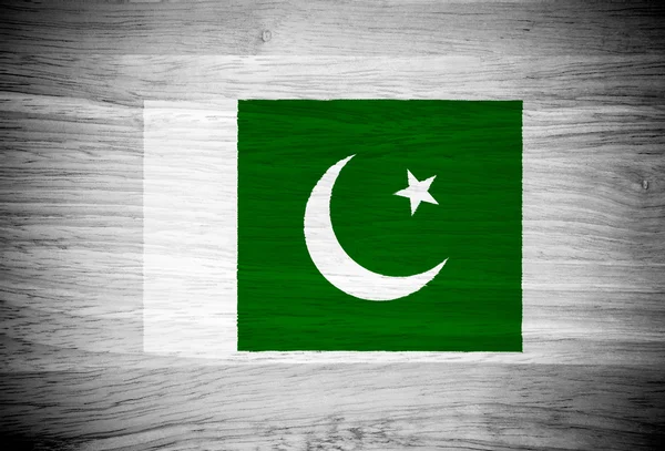 Pakistan flagga på trä textur — Stockfoto