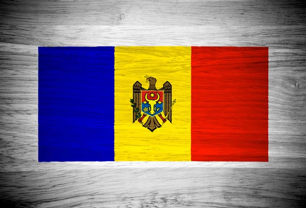 Moldaviens flagga på trä textur — Stockfoto