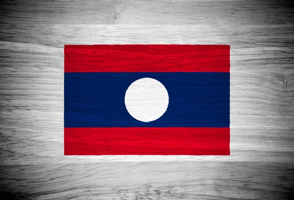 Laos Flagge auf Holz Textur — Stockfoto