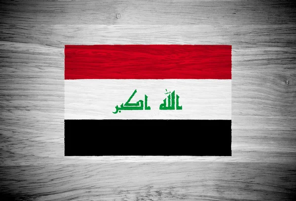 Irak flagga på trä textur — Stockfoto