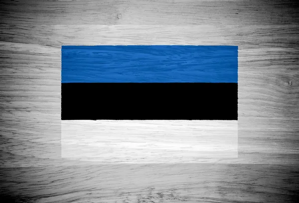 Bandera de Estonia sobre textura de madera — Foto de Stock