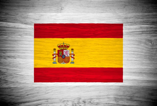 Bandera de España sobre textura de madera — Foto de Stock