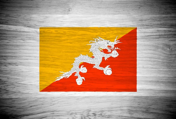 ウッド テクスチャにブータンの国旗 — ストック写真