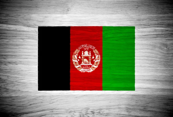 Bandera de Afganistán sobre textura de madera — Foto de Stock