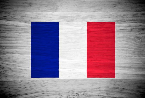 Bandera de Francia sobre textura de madera — Foto de Stock