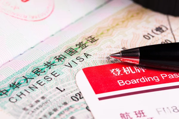 Cina visto in passaporto e carta d'imbarco — Foto Stock