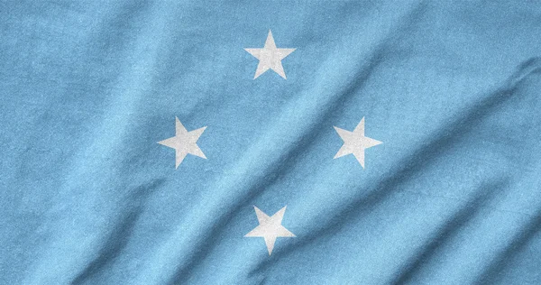 Potargane flaga Mikronezji — Zdjęcie stockowe