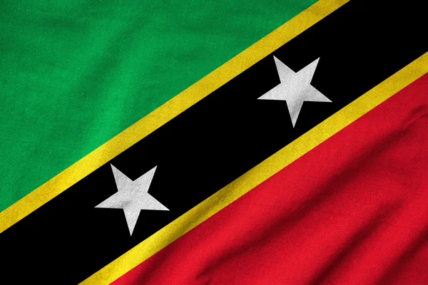 Saint kitts és nevis zászló fodros — Stock Fotó