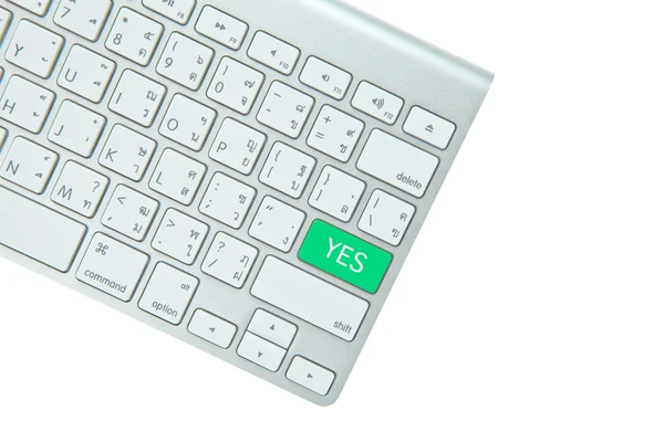 Green yes button on computer keyboard isolated on white backgrou — Stock Photo, Image