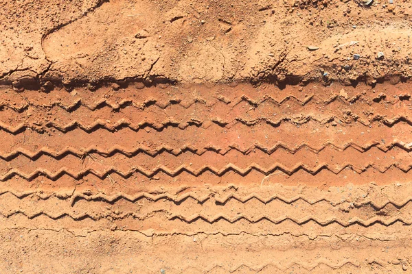 Closeup tire track on the ground — Stock Photo, Image