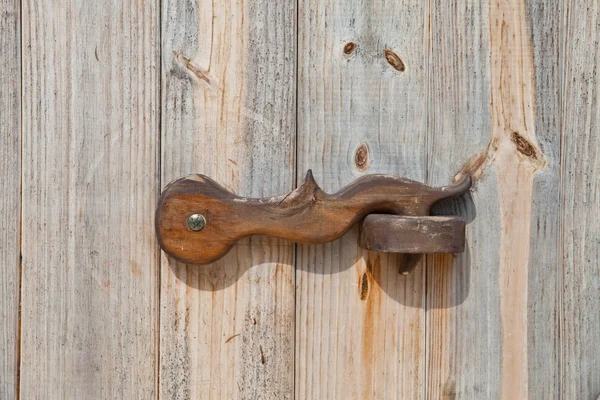 Close up view of a lock on old wooden door — Stock Photo, Image