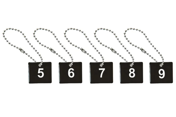Black metal key tag with number 5-9 — Stock Photo, Image
