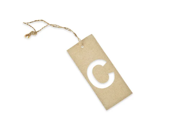Étiquette en papier brun avec lettre C coupée — Photo