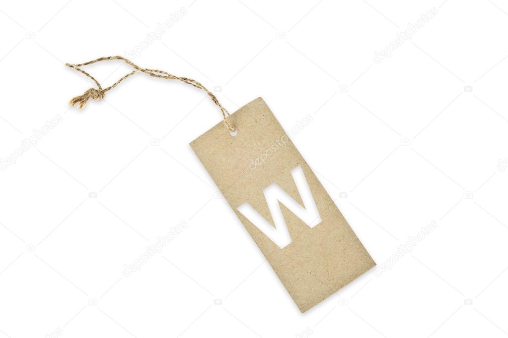 Brown paper tag with letter W cut