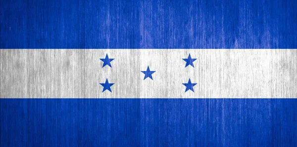 Honduras Bandera sobre fondo de madera — Foto de Stock