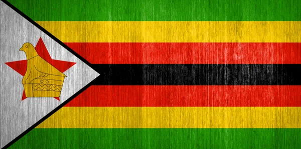 Zimbabwe Bandiera su fondo legno — Foto Stock