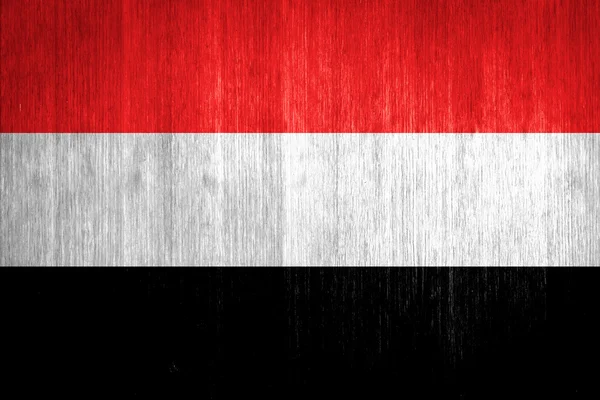 Bandera de Yemen sobre fondo de madera — Foto de Stock