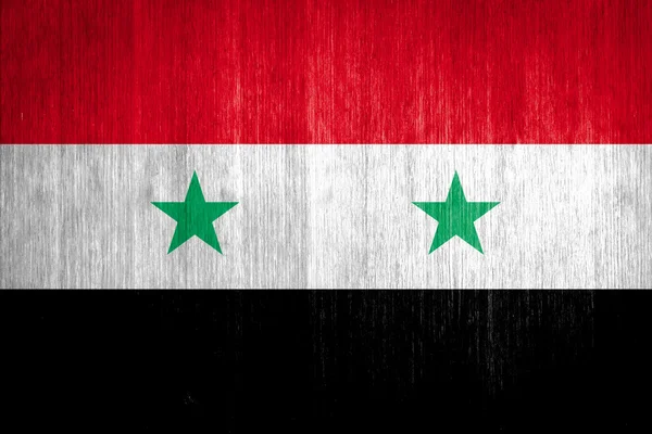木製の背景にシリアの旗 — ストック写真