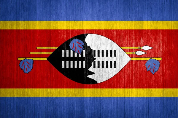 Bandeira da Suazilândia sobre fundo de madeira — Fotografia de Stock