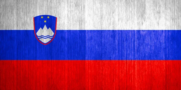 Slowenien Flagge auf Holz Hintergrund — Stockfoto