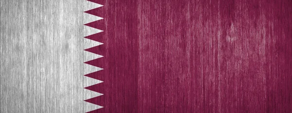 Qatar Flag on wood background — Stock Photo, Image