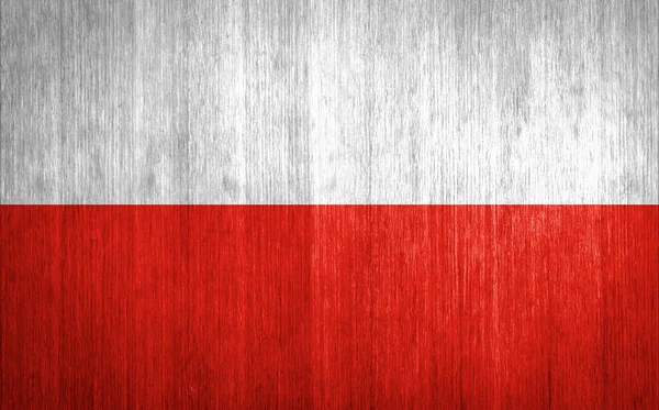 Прапор Польщі на фоні деревини — стокове фото