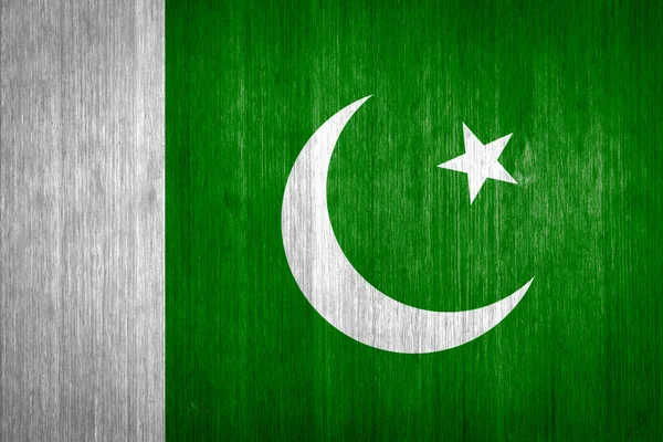 Bandera de Pakistán sobre fondo de madera — Foto de Stock