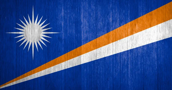 Marshallinseln Flagge auf Holz Hintergrund — Stockfoto