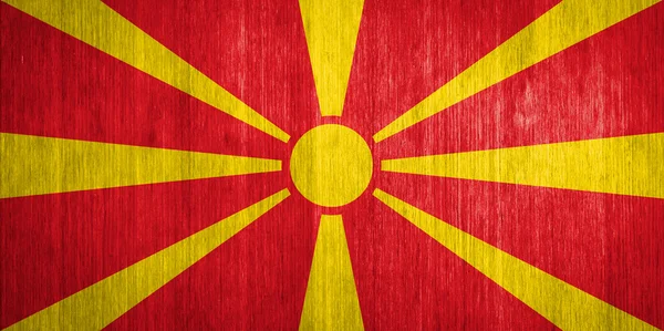Makedonya bayrak ahşap zemin üzerinde — Stok fotoğraf