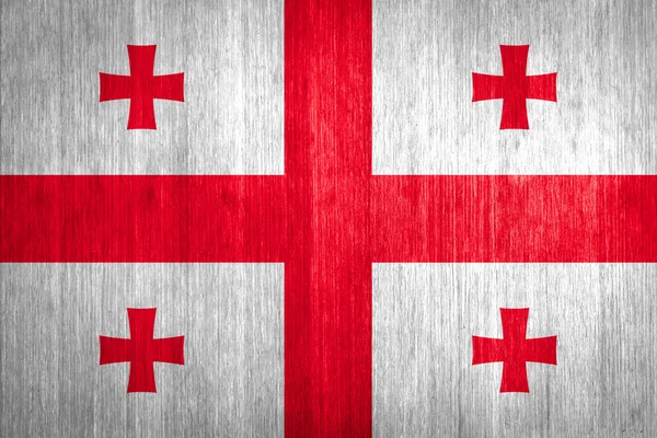 Прапор Грузії на фоні деревини — стокове фото