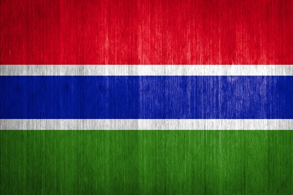 Gambia Flag on wood background — Stock Photo, Image