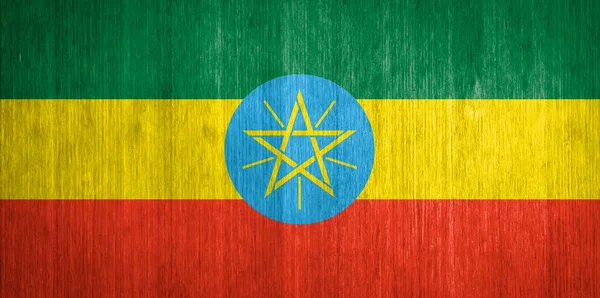 Bendera Ethiopia pada latar belakang kayu — Stok Foto