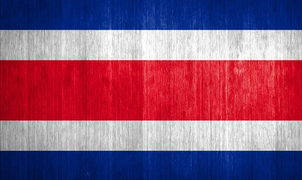 Costa Rica Flagge auf Holz Hintergrund — Stockfoto