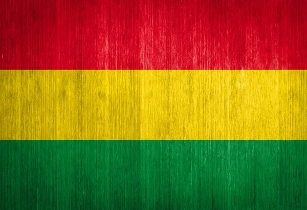 Drapeau de la Bolivie sur fond de bois — Stockfoto