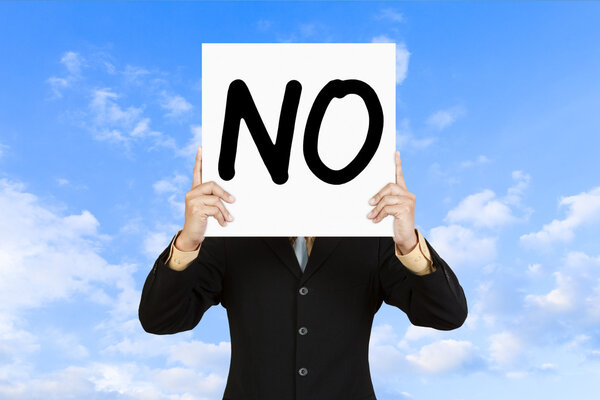 Businessman show wording No on paper board