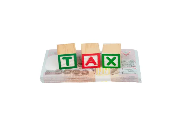 Tax block on money — Stock Photo, Image