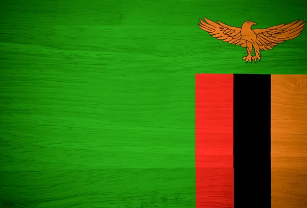 Zambia flag on wood texture — Stock Photo, Image