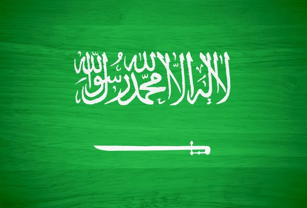 Saudi Arabia flag on wood texture — Stock Photo, Image