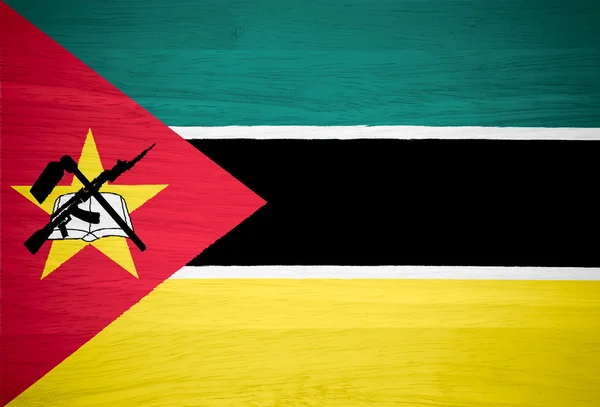 Vlajka Mosambiku na texturu dřeva — Stock fotografie