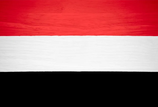 Bandera de Yemen sobre textura de madera — Foto de Stock