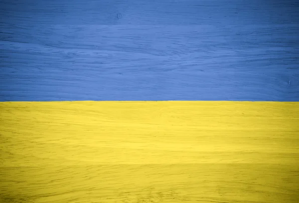 Vlajka Ukrajiny na texturu dřeva — Stock fotografie