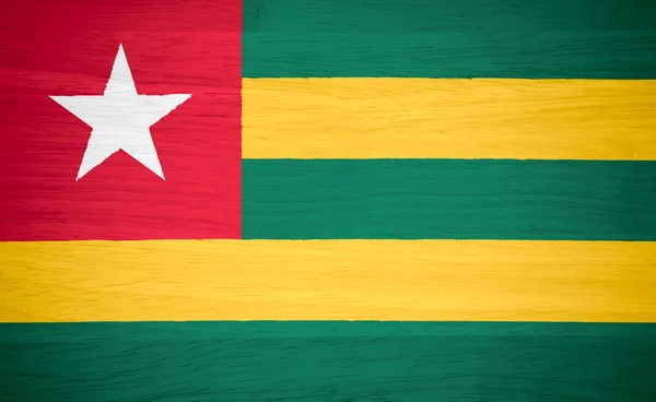 Flaga Togo na tekstury drewna — Zdjęcie stockowe