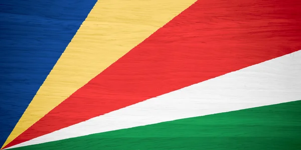 Seychelská vlajka na texturu dřeva — Stock fotografie